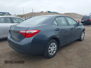 2014 Toyota Corolla L with VIN 2T1BURHE5EC027497, listed as a IAAI auction lot 42602880 with 101,094 mi miles and . Bid and sale history available at DreamBid. Image 4.