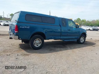 2000 Ford F-150 XL with VIN 1FTRX18W2YNC19493, listed as a IAAI auction lot 42127210 with 115,052 mi miles. Bid and sale history available at carsss.com. Image 4.