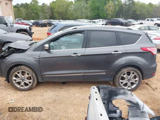 2015 Ford Escape Titanium with VIN 1FMCU9J90FUC14650, listed as a IAAI auction lot 41992858 with 158,963 mi miles and . Bid and sale history available at DreamBid. Image 14.