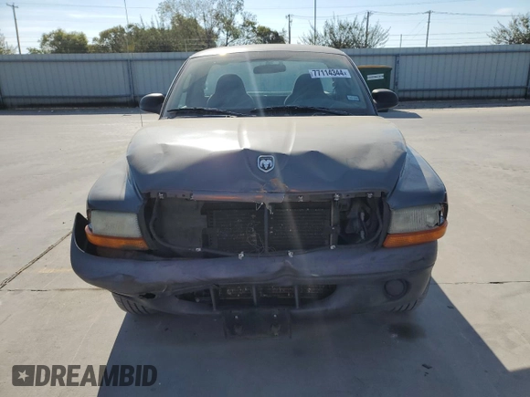 2003 Dodge Dakota with VIN 1D7FL16X13S189963, listed as a Copart auction lot 77114344 with 100,127 mi miles and Salvage Title. Bid and sale history available at carsss.com. Image 5.