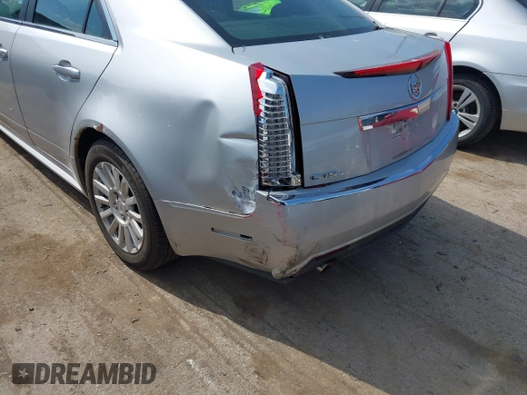 2011 Cadillac CTS Sedan Luxury with VIN 1G6DG5EY5B0165976, listed as a IAAI auction lot 42088157 with 151,004 mi miles. Bid and sale history available at carsss.com. Image 6.