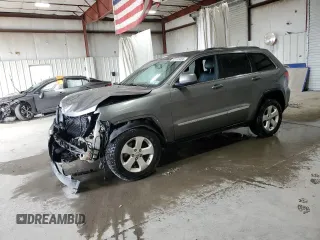2013 Jeep Grand Cherokee Laredo with VIN 1C4RJFAG3DC612250, listed as a Copart auction lot 53155455 with 157,895 mi miles and Salvage Title. Bid and sale history available at carsss.com. Image 1.