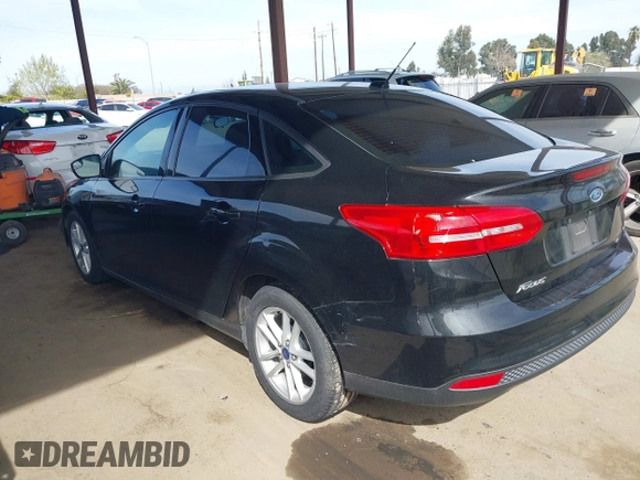 2015 Ford Focus SE with VIN 1FADP3F25FL330463, listed as a IAAI auction lot 41755867 with 72,725 mi miles. Bid and sale history available at carsss.com. Image 3.
