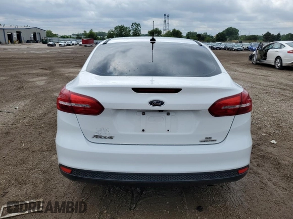 2016 Ford Focus SE с VIN 1FADP3F27GL222556, выставлен на аукционе Copart как лот 59638585 с пробегом 125 648 миль миль и Списание • Salvage title. История ставок и продаж доступна на DreamBid. Изображение 6.