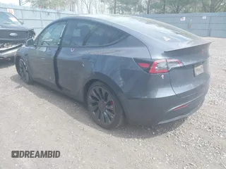 2022 Tesla Model Y Performance with VIN 7SAYGDEF3NF324705, listed as a IAAI auction lot 42076565 with 66,573 mi miles and . Bid and sale history available at carsss.com. Image 3.