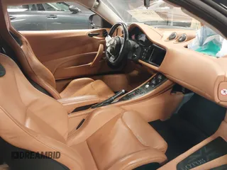 2013 Lotus Evora z VIN SCCLMDSU7DHA10025, wystawiony jako IAAI lot #41298776 z przebiegiem 18 194 mil mil oraz . Historia ofert i sprzedaży dostępna na DreamBid. Obrazek 5.