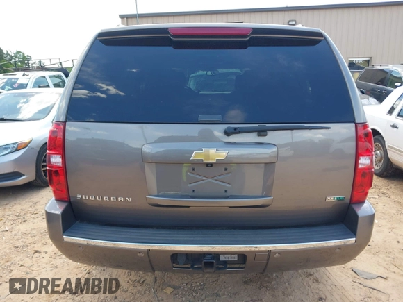 2011 Chevrolet Suburban LTZ with VIN 1GNSKKE3XBR394436, listed as a IAAI auction lot 42324225 with 132,871 mi miles and . Bid and sale history available at DreamBid. Image 16.