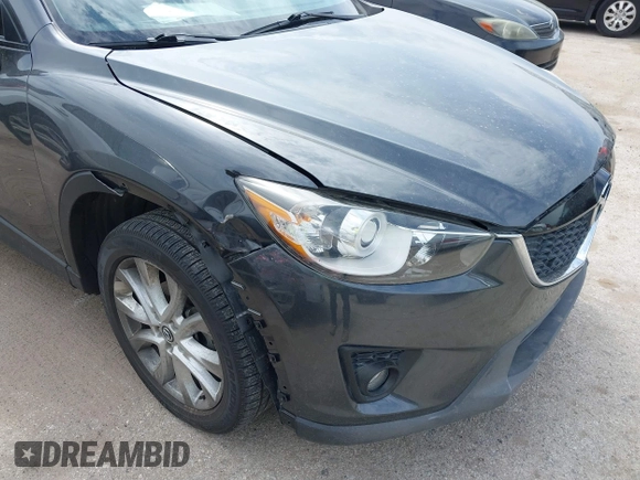 2014 Mazda CX-5 Grand Touring with VIN JM3KE2DY0E0354220, listed as a IAAI auction lot 41885502 with 168,901 mi miles. Bid and sale history available at carsss.com. Image 6.