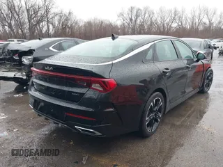 2022 Kia K5 GT-Line z VIN 5XXG64J20NG155965, wystawiony jako IAAI lot #41642454 z przebiegiem 29 647 mil mil oraz . Historia ofert i sprzedaży dostępna na DreamBid. Obrazek 4.