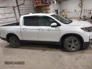 2022 Honda Ridgeline RTL-E z VIN 5FPYK3F76NB033832, wystawiony jako IAAI lot #41838047 z przebiegiem 16 497 mil mil oraz . Historia ofert i sprzedaży dostępna na DreamBid. Obrazek 14.