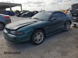 1998 Ford Mustang GT z VIN 1FAFP42X0WF255816, wystawiony jako Copart lot #55011425 z przebiegiem 144 397 mil mil oraz Czysty tytuł • Clean title. Historia ofert i sprzedaży dostępna na DreamBid. Obrazek 1.