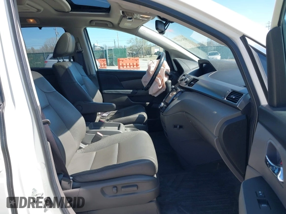 2016 Honda Odyssey EX-L z VIN 5FNRL5H65GB055317, wystawiony jako IAAI lot #41825497 z przebiegiem 117 672 mil mil oraz . Historia ofert i sprzedaży dostępna na DreamBid. Obrazek 5.