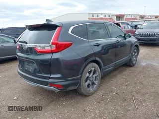 2017 Honda CR-V EX with VIN 7FARW1H54HE043494, listed as a IAAI auction lot 41887318 with 93,904 mi miles. Bid and sale history available at carsss.com. Image 4.