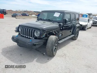 2022 Jeep Wrangler Unlimited Sahara with VIN 1C4JJXP69NW269462, listed as a IAAI auction lot 41759162 with 19,629 mi miles and . Bid and sale history available at DreamBid. Image 2.