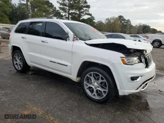 2021 Jeep Grand Cherokee Overland with VIN 1C4RJFCG1MC671472, listed as a Copart auction lot 86326714 with 103,760 mi miles and Salvage Title. Bid and sale history available at carsss.com. Image 4.