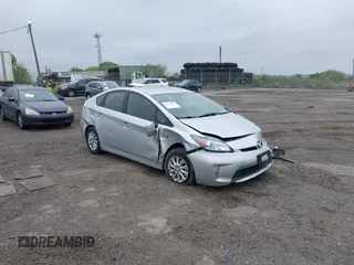 2014 Toyota Prius z VIN JTDKN3DP1E3050561, wystawiony jako IAAI lot #42199673 z przebiegiem 187 315 mil mil oraz . Historia ofert i sprzedaży dostępna na DreamBid. Obrazek 1.