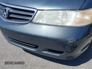 2004 Honda Odyssey EX with VIN 5FNRL18684B027564, listed as a IAAI auction lot 42044126 with 185,627 mi miles and . Bid and sale history available at DreamBid. Image 13.