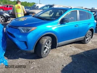 2016 Toyota RAV4 LE with VIN JTMBFREV2GD183811, listed as a IAAI auction lot 42216793 with 95,270 mi miles and . Bid and sale history available at DreamBid. Image 17.