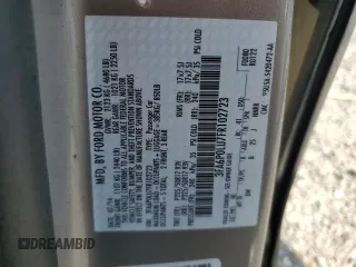 2015 Ford Fusion SE Hybrid z VIN 3FA6P0LU7FR102723, wystawiony jako Copart lot #62334345 z przebiegiem 136 341 mil mil oraz Nie do naprawy • Non repairable. Historia ofert i sprzedaży dostępna na DreamBid. Obrazek 12.