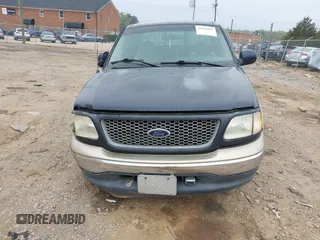 1999 Ford F-150 XL with VIN 1FTRX17L8XNA16906, listed as a IAAI auction lot 41945377 with 249,475 mi miles. Bid and sale history available at carsss.com. Image 13.