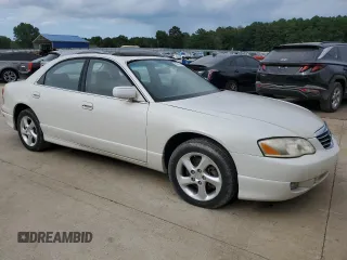 2001 Mazda Millenia z VIN JM1TA221911717066, wystawiony jako Copart lot #63341244 z przebiegiem 234 263 mil mil oraz Szkoda całkowita • Salvage title. Historia ofert i sprzedaży dostępna na DreamBid. Obrazek 4.