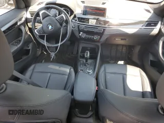 2021 BMW X1 xDrive28i with VIN WBXJG9C06M5S33201, listed as a Copart auction lot 66391015 with 53,395 mi miles and Salvage title. Bid and sale history available at DreamBid. Image 8.