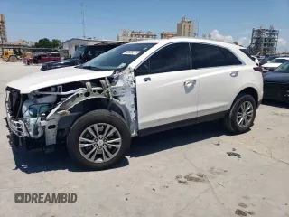 2023 Cadillac XT5 FWD Premium Luxury with VIN 1GYKNCRSXPZ232928, listed as a Copart auction lot 65538215 with 27,915 mi miles and Salvage title. Bid and sale history available at DreamBid. Image 1.
