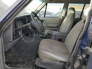 1996 Jeep Cherokee Sport with VIN 1J4FT68S4TL333342, listed as a Copart auction lot 41664965 with 185,199 mi miles and Clean Title. Bid and sale history available at carsss.com. Image 7.
