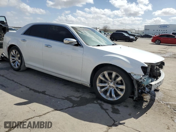 2015 Chrysler 300 C with VIN 2C3CCAET3FH739529, listed as a Copart auction lot 47520495 with 151,096 mi miles and Salvage Title. Bid and sale history available at DreamBid. Image 4.
