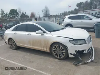 2017 Lincoln MKZ Reserve z VIN 3LN6L5EC2HR613827, wystawiony jako IAAI lot #41800613 z przebiegiem 199 097 mil mil oraz . Historia ofert i sprzedaży dostępna na DreamBid. Obrazek 13.
