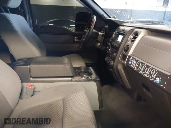 2013 Ford F-150 XL with VIN 1FTFW1ET8DFB48563, listed as a IAAI auction lot 42103243 with 257,778 mi miles. Bid and sale history available at carsss.com. Image 5.