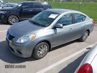 2012 Nissan Versa SL with VIN 3N1CN7AP7CL921404, listed as a IAAI auction lot 42044819 with 126,942 mi miles. Bid and sale history available at carsss.com. Image 2.
