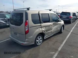 2015 Ford Transit Connect XLT z VIN NM0AE8F74F1179538, wystawiony jako IAAI lot #41505221 z przebiegiem 57 798 mil mil oraz . Historia ofert i sprzedaży dostępna na DreamBid. Obrazek 4.