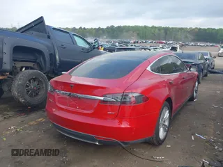 2013 Tesla Model S with VIN 5YJSA1CN1DFP09756, listed as a IAAI auction lot 41921720 with 94,770 mi miles. Bid and sale history available at carsss.com. Image 4.