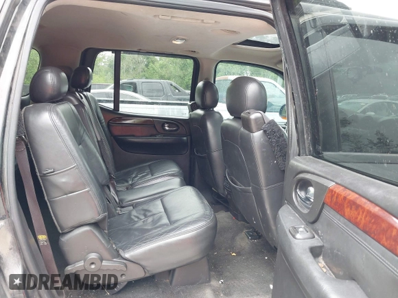 2005 GMC Envoy XL SLE with VIN 1GKET16S156114805, listed as a IAAI auction lot 42163519 with 168,584 mi miles. Bid and sale history available at carsss.com. Image 8.