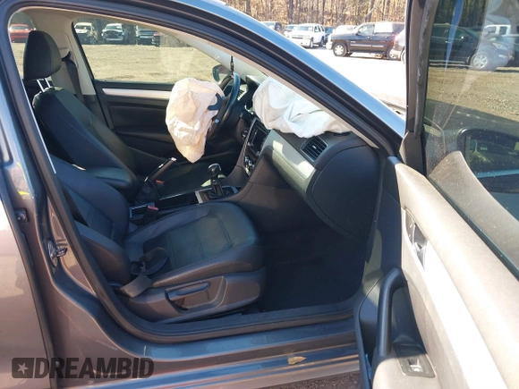 2012 Volkswagen Passat SE with VIN 1VWBH7A36CC027321, listed as a IAAI auction lot 41596709 with 173,357 mi miles and . Bid and sale history available at DreamBid. Image 5.