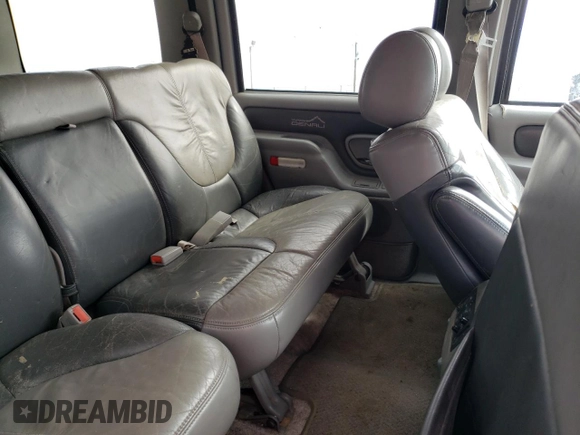 1999 GMC Denali with VIN 1GKEK13R0XR915053, listed as a Copart auction lot 49241145 with 2,664,121 mi miles and Salvage Title. Bid and sale history available at carsss.com. Image 11.