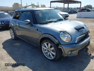 2007 MINI Hardtop S with VIN WMWMF73597TL86892, listed as a IAAI auction lot 42157544 with 93,097 mi miles and . Bid and sale history available at DreamBid. Image 1.
