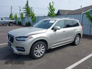 2016 Volvo XC90 T6 Momentum with VIN YV4A22PK7G1038750, listed as a IAAI auction lot 42128057 with 124,112 mi miles. Bid and sale history available at carsss.com. Image 17.