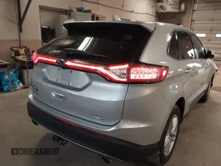 2015 Ford Edge SEL with VIN 2FMTK4J96FBB53500, listed as a IAAI auction lot 41974097 with 199,331 mi miles. Bid and sale history available at carsss.com. Image 4.