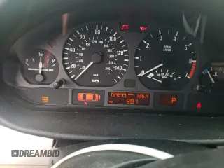 2002 BMW 3 Series 325xi with VIN WBAEU33402PF71539, listed as a Copart auction lot 58396995 with 154,644 mi miles and Salvage title. Bid and sale history available at DreamBid. Image 9.