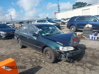1999 Toyota Corolla VE z VIN 1NXBR12E3XZ218901, wystawiony jako IAAI lot #42318279 z przebiegiem 167 067 mil mil oraz . Historia ofert i sprzedaży dostępna na DreamBid. Obrazek 1.