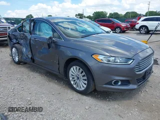 2014 Ford Fusion SE Hybrid with VIN 3FA6P0LU6ER132813, listed as a IAAI auction lot 42584305 with 145,248 mi miles and . Bid and sale history available at DreamBid. Image 1.