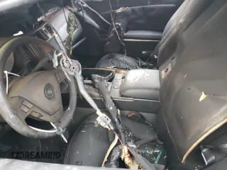 2004 Cadillac XLR z VIN 1G6YV34AX45601257, wystawiony jako Copart lot #44490755 z przebiegiem Nie podano mil oraz Szkody całkowita. Historia ofert i sprzedaży dostępna na DreamBid. Obrazek 7.