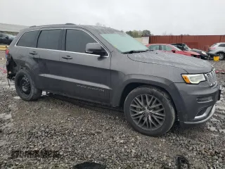 2017 Jeep Grand Cherokee Summit with VIN 1C4RJFJT1HC818136, listed as a Copart auction lot 81057084 with 135,843 mi miles and Salvage title. Bid and sale history available at DreamBid. Image 4.