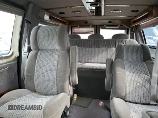 1999 Ford Econoline Cargo with VIN 1FDRE14W6XHA56562, listed as a Copart auction lot 75185804 with 153,673 mi miles and Clean Title. Bid and sale history available at carsss.com. Image 10.