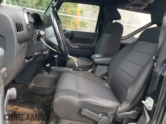 2011 Jeep Wrangler Sport with VIN 1J4AA2D18BL505697, listed as a Copart auction lot 53162175 with 144,024 mi miles and Clean Title. Bid and sale history available at carsss.com. Image 7.