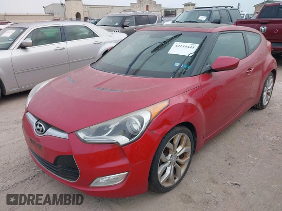2013 Hyundai Veloster w/Gray Int with VIN KMHTC6AD2DU141462, listed as a IAAI auction lot 42136445 with 122,146 mi miles and . Bid and sale history available at DreamBid. Image 2.