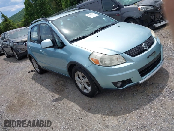 2009 Suzuki SX4 Touring AWD z VIN JS2YB417096201672, wystawiony jako IAAI lot #42209018 z przebiegiem 64 879 mil mil oraz . Historia ofert i sprzedaży dostępna na DreamBid. Obrazek 1.