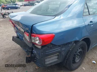 2013 Toyota Corolla L with VIN 5YFBU4EE9DP210262, listed as a IAAI auction lot 42209025 with 204,463 mi miles and . Bid and sale history available at DreamBid. Image 19.